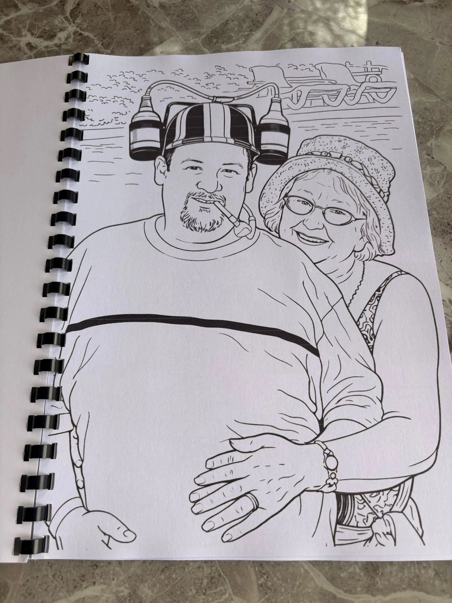 Black and white drawing of a couple on a spiral-bound notebook page.